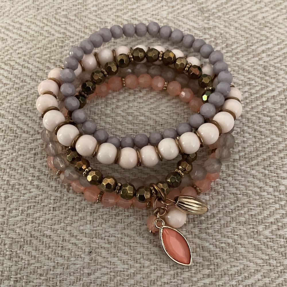 Beaded grey, cream, gold, and peach summer bracelet.